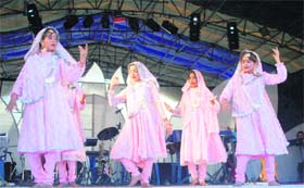 School girls performing on the first day of the International Summer Festival at the Ridge in Shimla