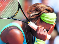 Serena Williams reacts after losing to Samantha Stosur on Wednesday