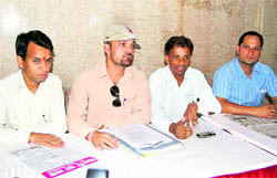 Members of the Rawanlta-Jaunpur Community Sangharsh Samiti address a press conference on Thursday 