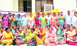 Women health employees stage a dharna in Haridwar on Thursday