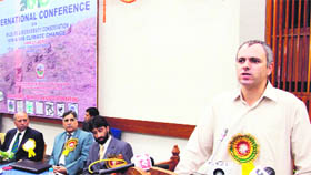 Chief Minister Omar Abdullah addresses a conference on Wildlife and Biodiversity Conservation vis--vis Climate Change in Srinagar on Thursday.