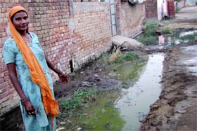 Overflowing drains make life pathetic at Bakhunangal village
