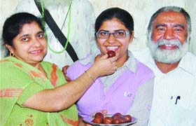 Prabhjot Kaur with her parents