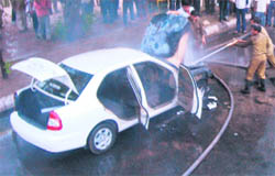 The car that caught fire in Ludhiana.
