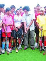 Union Sports Minister M.S. Gill inaugurates the synthetic astroturf in Guru Nanak Dev University in Amritsar on Friday.