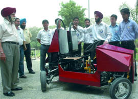 The students of mechanical engineering of the GGS College of Engineering and Technology (GGSCET) display the unique vehicle invented by them on Friday