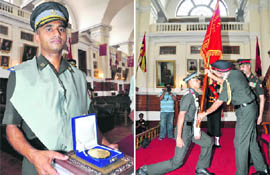 Pankaj Bhattacharjee with the Chief of Army Staff gold medal and (right) Lt-Gen RS Sujlana, Commandant, presents colours to Sudhir Kumar Kala, senior cadet captain, who got Chief of Army Staff silver medal, at IMA in Dehradun on Friday.