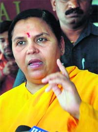 Bharatiya Janshakti Party president Uma Bharti addresses mediapersons in Karnal
