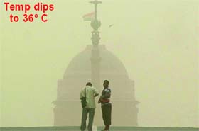Dust envelops the Rashtrapati Bhavan in New Delhi