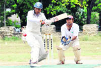   A batsman plays a shot at the Uttarakhand Challengers Cup in Dehradun on Saturday.