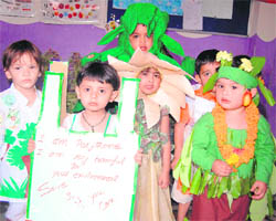 Children participate in a World Environment Day function in Haridwar on Saturday. 