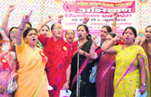 Women shout slogans in support of the Womens Reservation Bill at the Gandhi Park in Dehradun on Saturday.
