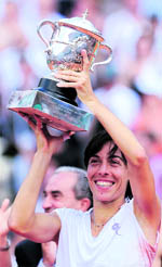 Francesca Schiavone holds the winners trophy after beating Samantha Stosur in the women's final on Saturday. Schiavone won 6-4, 7-6