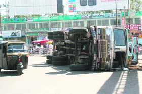 A truck overturned after its driver lost control over it at Sawatri Chowk in Jammu
