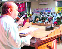 Anil Kumar Bhatnagar, general secretary of the Northern Zone Insurance Employees Association, during a conference in Ludhiana on Sunday