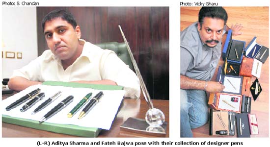 (L-R) Aditya Sharma and Fateh Bajwa pose with their collection of designer pens