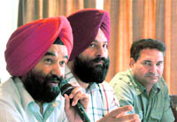 Patron of the Ludhiana Builders Association SS Mavi addresses the media in Ludhiana on Sunday