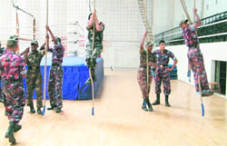 NCC cadets participate in the rope-climbing session as part of their attachment with the Indian Military 