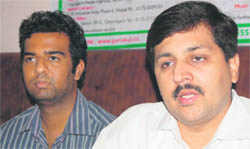 Deshraj Thakral, executive director of Gurukul Vidyapeeth, Chandigarh, addresses a press conference in Dehradun on Monday. 