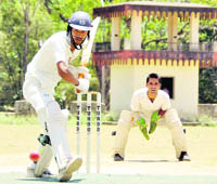 A batsman plays a shot at the Uttarakhand Challengers Cup in Dehradun on Monday.
