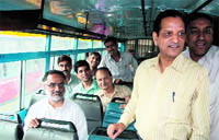 BJP MP Rajan Sushant sitting in a bus