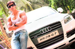 Sonu Sood poses with his Audi Q7