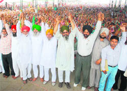 Activists of organisations of farmers and labourers take part in a rally held at Moga on Monday.