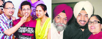 Dipin Goel (left) and Anand Singh Brar, who stood first and second, respectively, in the PMET-2010 with members of their families.