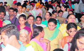 Students jostle to submit re-evaluation forms at the Punjab School Education Boards headoffice at Mohali on Monday.
