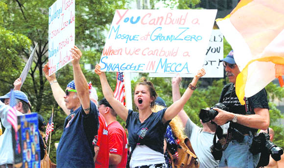 People in New York protest the proposed construction of a mosque near the World Trade Center site on Sunday.