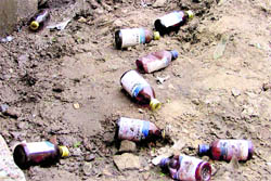 Empty cough syrup bottles near the Ludhiana bus stand