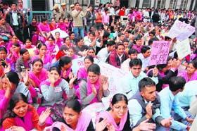 Activists of the JBT Students Welfare Association hold a protest in support of their demands in front of the Himachal Secretariat in Shimla