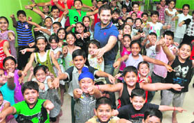Children have fun during a dance workshop in Ludhiana on Wednesday.