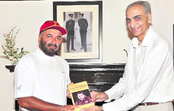 Gen JJ Singh (retd) being presented a book by Upendra Arora of Natraj Publishers in Dehradun on Thursday.
