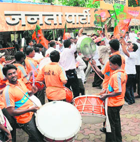 BJP supporters celebrate the unoppossed election of their party candidate Puyush Goyal to the Rajya Sabha in Mumbai on Thursday