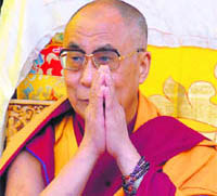 The Dalai Lala acknowledges the greetings of devotees