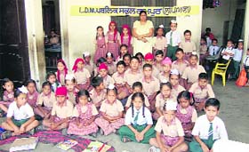 Pardeep with children of her school at Rampur village