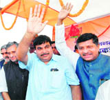 BJP leaders Nitin Gadkari, Ravishankar Prasad and Sushil Modi at Patna airport on Friday. 