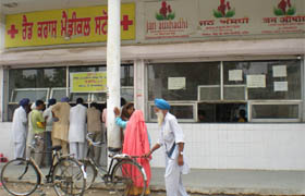 The Jan Aushadhi counter (right) lies vacant while patients throng the counter of the Red Cross Medical Store at the Civil Hospital in Bathinda.