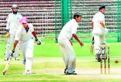 Players in action during a match between Chandigarh and Ropar at the Sector-16 Cricket Stadium in Chandigarh on Saturday
