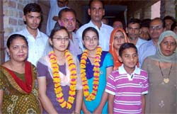 Jyoti and Kanta were felicitated in their village for clinching first and third position respectively in the state in the senior secondary exam
