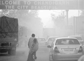 HAZY Welcome: A lot of dust greets people at entry to Chandigarh from the Zirakpur side. 