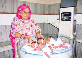 Bhateri Devi with her triplets in Hisar