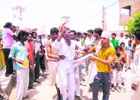 Protesters block traffic at Balmiki Chowk in Sirsa