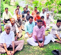 Residents perform yoga at a park created along the Budha Nullah in Ludhiana on Sunday
