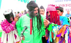 A play being staged by the Pinder Ghati Sanskritik Samoh on World Blood Donors Day at the Doon Hospital in Dehradun on Monday