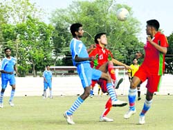 A match of the Dehradun Football League in progress on Monday