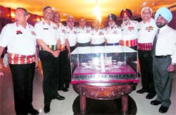 Alumni of the 1971 batch of the Indian Military Academy, also known as the Born to Battle course, who presented a silver trophy to their alma mater in Dehradun on Monday