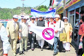 Vidhan Sabha Speaker Harbans Kapoor attends a rally on Elder Abuse Awareness Day in Mussoorie