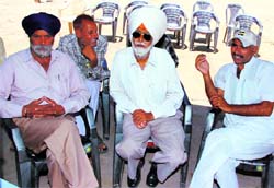 Residents of Nanga village talk to The Tribune team in the Vijaypur block of Samba district on Monday